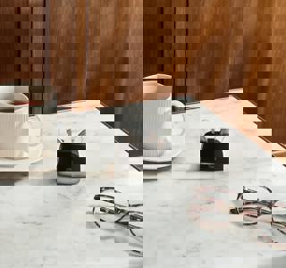 Table With Charger And Aids Widex