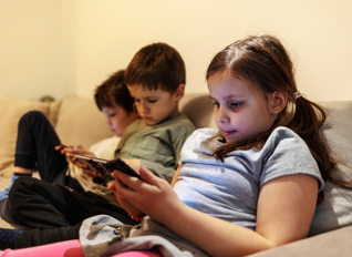 Kids On Ipad Istock 1390844742