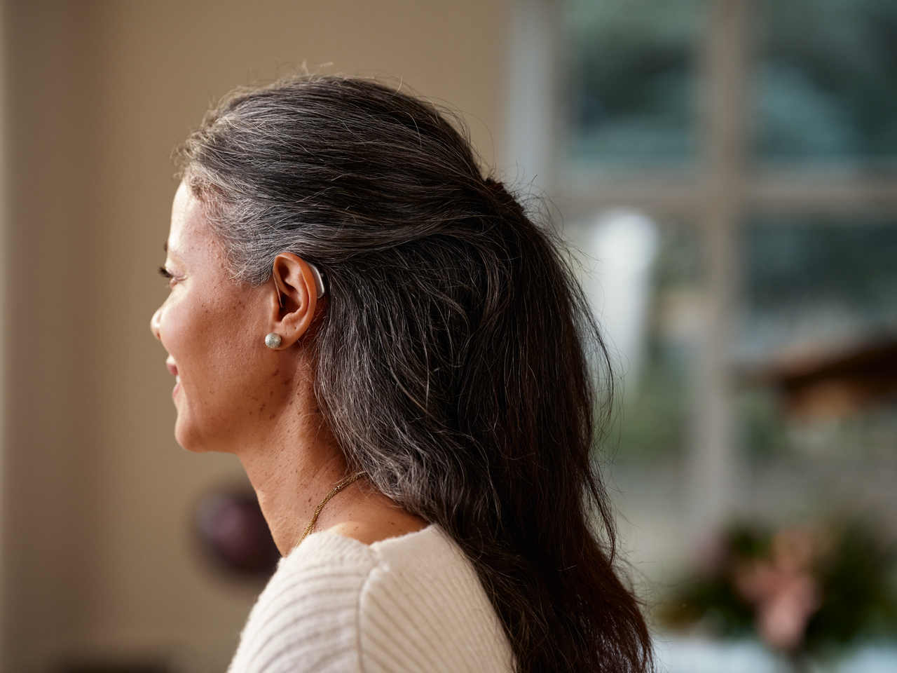 Widex Hearing Aid Woman