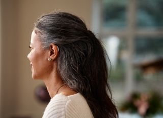 Widex Hearing Aid Woman